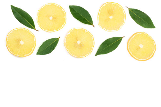 istock lemon with leaves and slices isolated on white background with copy space for your text. Flat lay, top view 895617052
