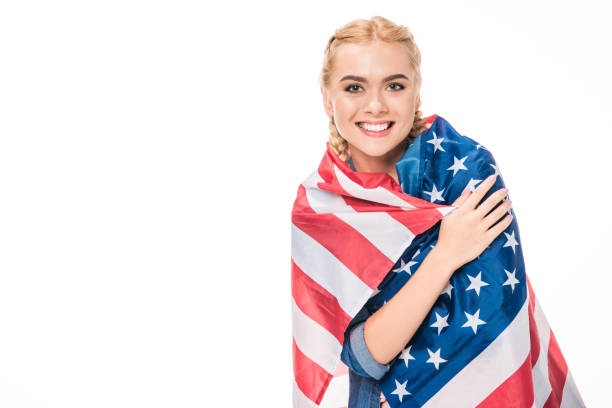 istock young woman with us flag 895623114