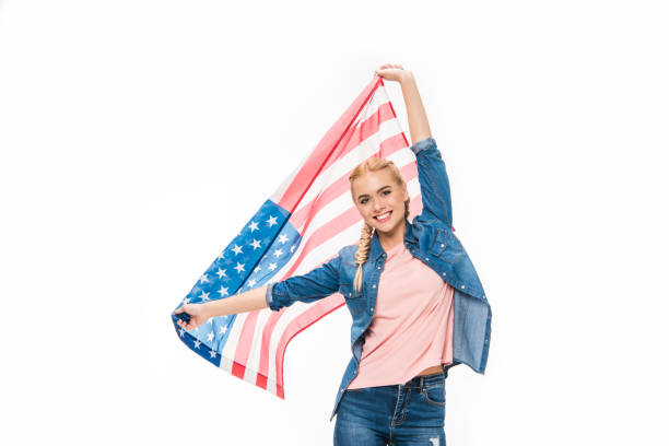 istock young woman with us flag 895623192