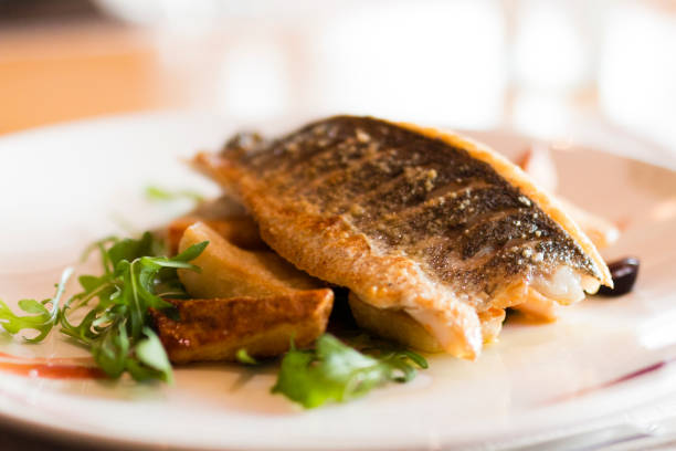 istock Delicious fish meal in restaurant 895633644