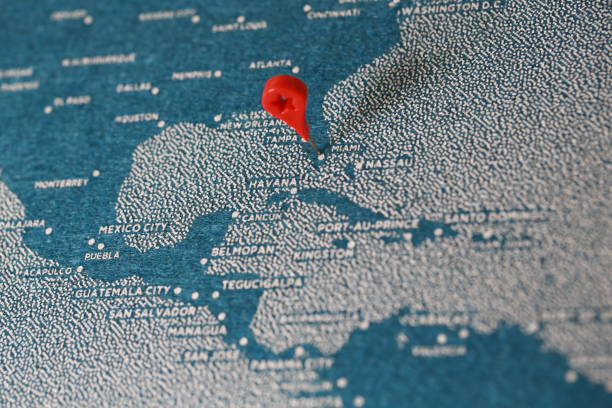 istock airplane fly on the blue felt painted map 895634424