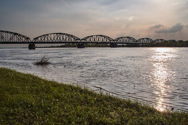 istock Arched, steel road bridge over the River Vistula 895634524