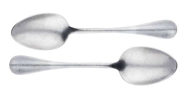istock Metal spoon isolated on white background top view 895643666