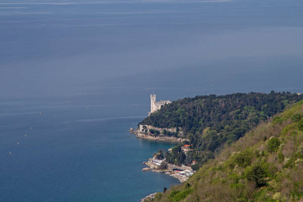 View from the Napoleonica to Miramare castle that was built on a rocky cliff near Trieste in the 19th century