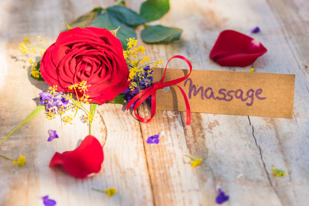 Bunch of flowers with gift card for Massage