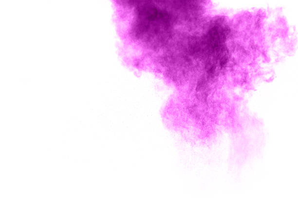 istock abstract violet dust explosion on  white  background. abstract violet powder splattered on white background, Freeze motion of  violet powder exploding. 895647086