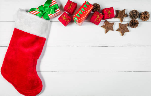 istock Christmas Stocking with Presents and Ornaments Rolling Out 895663994