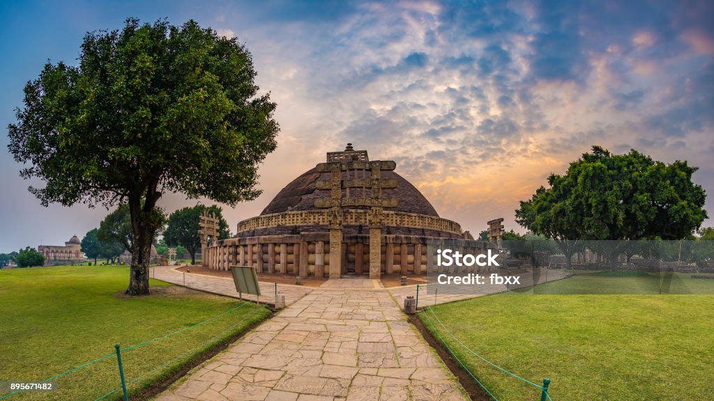 Sanchi Stupa, Madhya Pradesh, India. Ancient buddhist building, religion mystery, carved stone. Sunrise sky. Sanchi Stock Photo