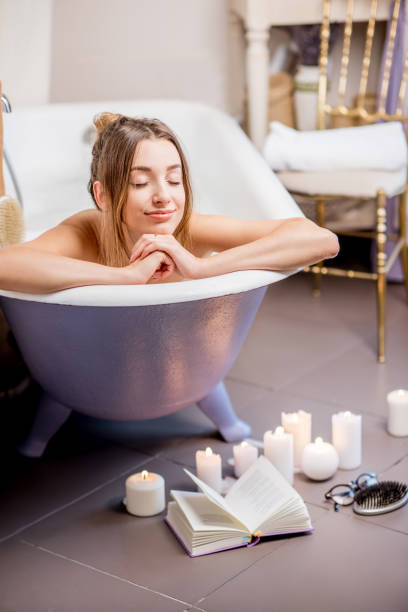 istock Woman bathing at the retro bathroom 895674712