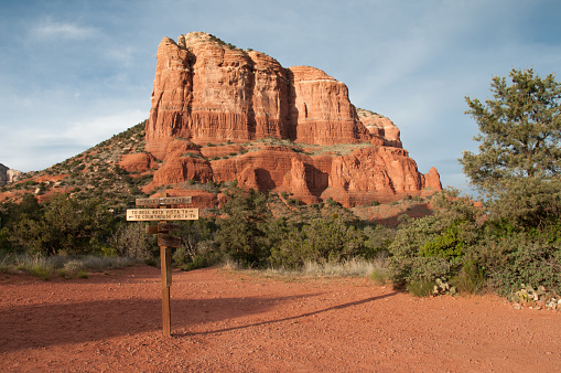 Wooden sign to direct hikers on paths among the famous red rocks in Sedona Arizona
