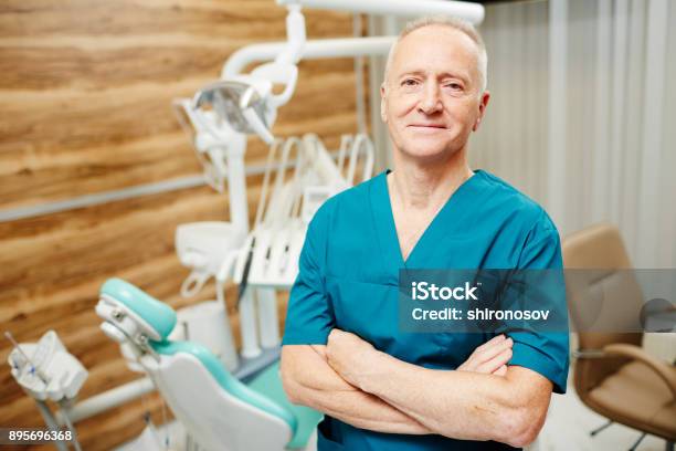 Dentist In Clinics Stock Photo - Download Image Now - Dentist, Owner, Small Business