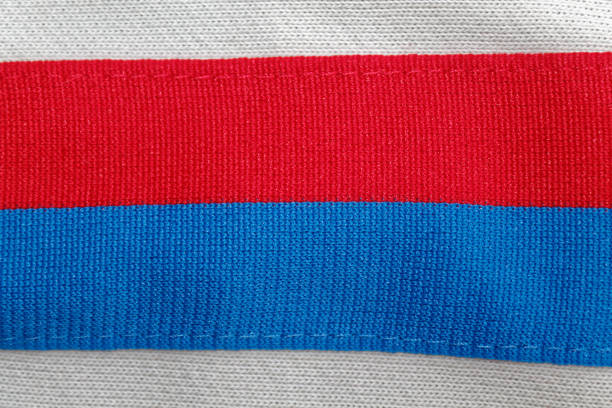 istock Striped cotton fabric colorful texture with red and blue lines for bckground 895696582
