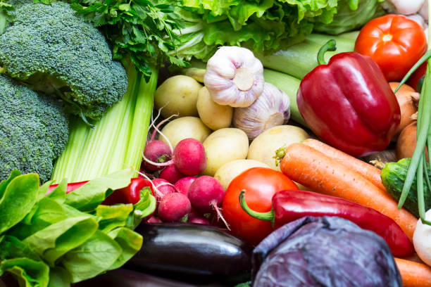 istock Background of fresh vegetables and greens 895700176