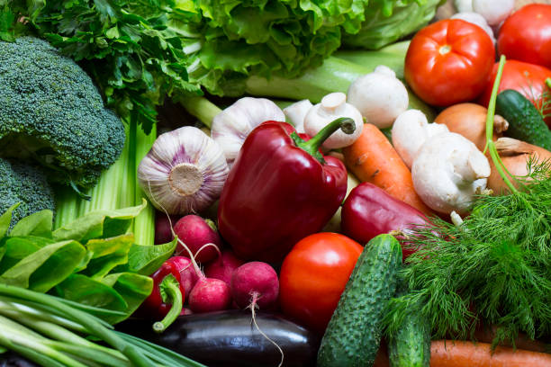 istock Background of fresh vegetables and greens 895702416