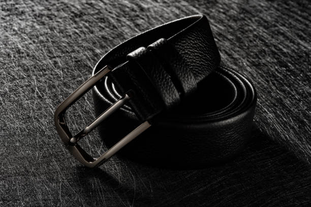 elegant leather belt for men on a dark background