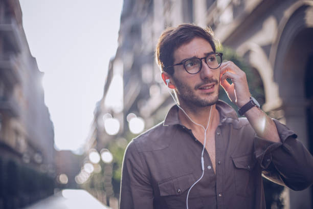 istock Handsome man listening to some music 895715860
