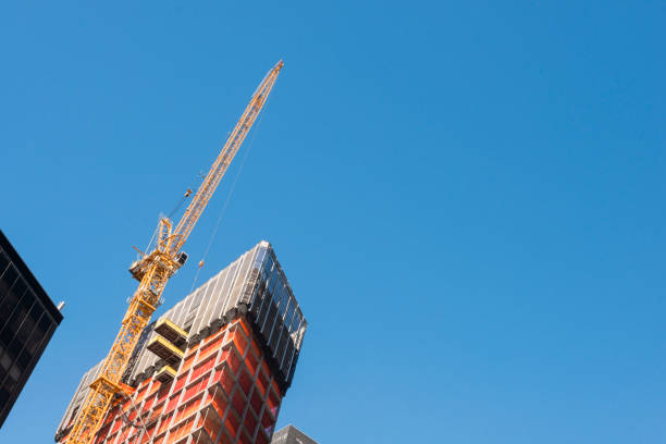 istock Industrial Construction Crane with Building Architecture Urban NYC Manhattan 895719594