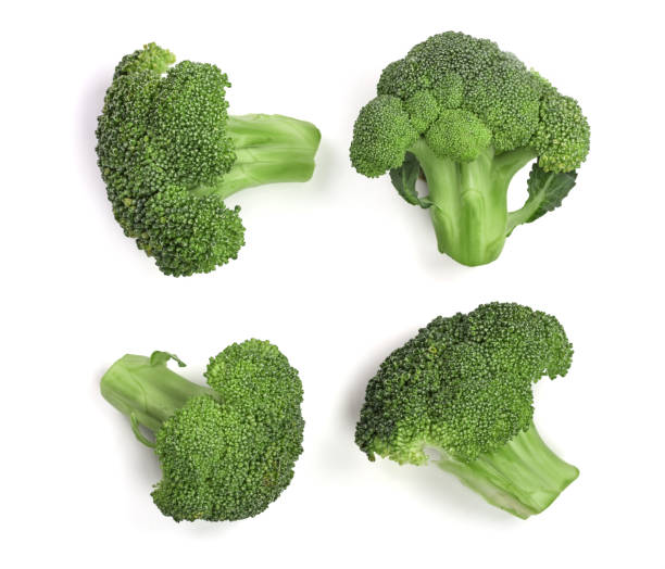 istock fresh broccoli isolated on white background close-up. Top view 895741084