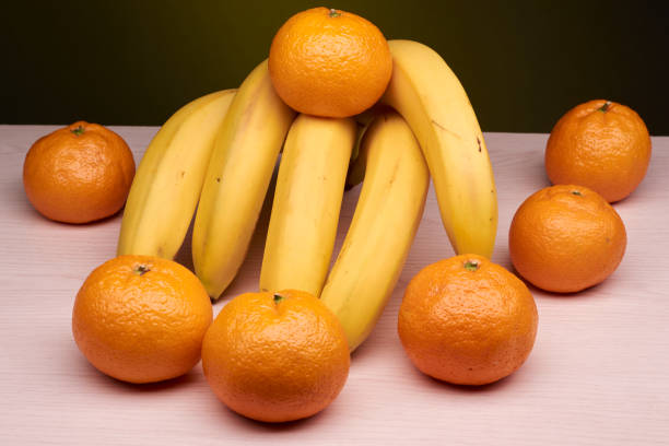 istock beautiful and useful tangerines and bananas 895743736