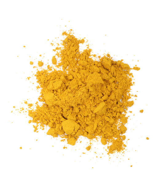 istock Turmeric or Curcuma powder pile isolated on white background, top view 895743742