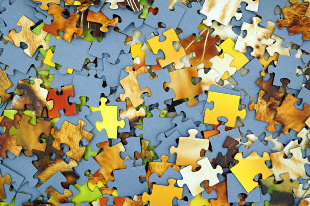 istock Background of puzzle pieces 895743988
