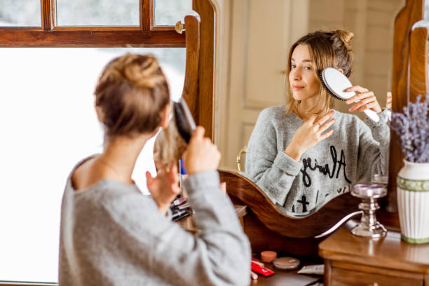 istock Woman sitting at the dressing table during the winter 895749616
