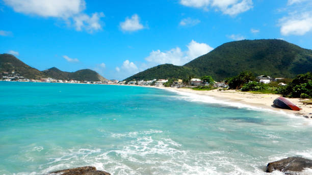 istock wrecked yacht on St. Martin beach 895751986