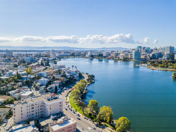 Lake Merritt Aerial View Aerial view above Lake Merritt in Oakland, California. Looking across the lake at downtown Oakland with skyscrapers in the distance. california stock pictures, royalty-free photos & images