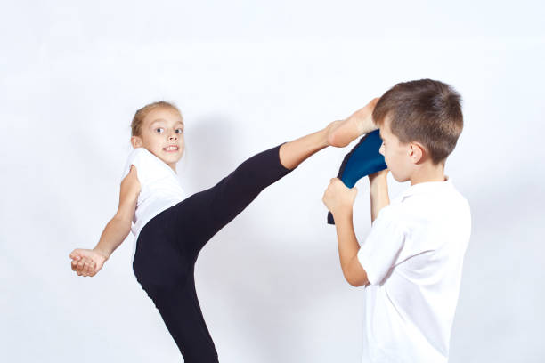 istock The girl is kicking on simulator 895781582
