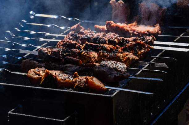 istock Shish kebab preparing on skewers 895790932
