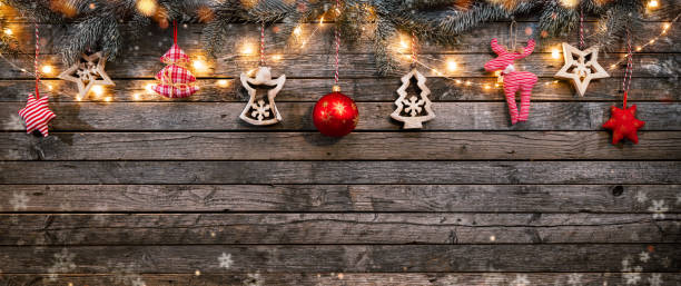 istock Christmas background with wooden decorations and spot lights. 895798884