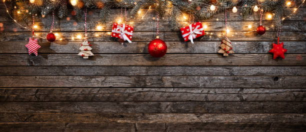 istock Christmas background with wooden decorations and spot lights. 895798938