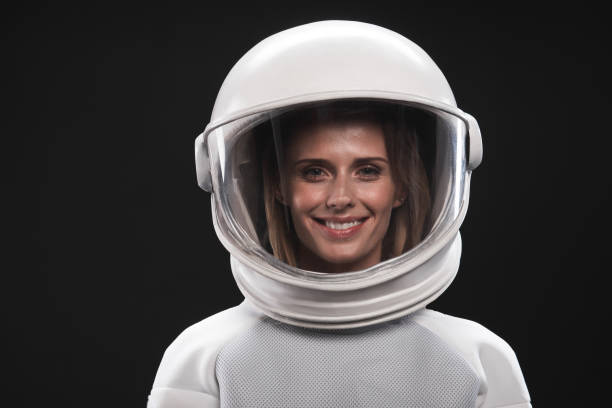 attractive spacewoman is expressing gladness - spacewoman imagens e fotografias de stock