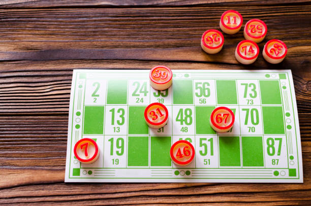 istock play bingo on wooden table 895808608