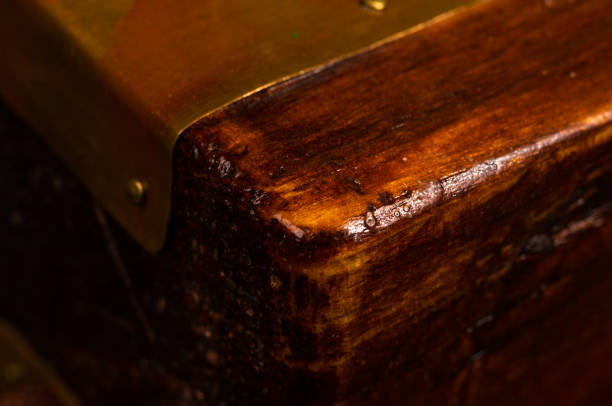 istock dark weathered teak wood with copper 895813282