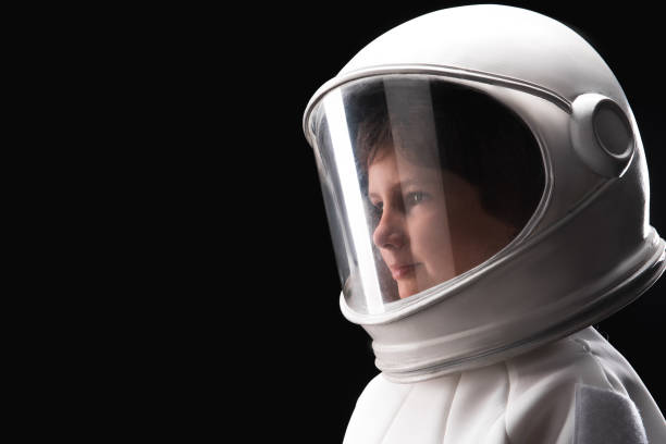 istock Pleasant kid cosmonaut is dreaming about future 895813540