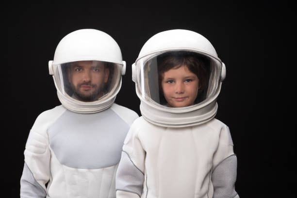 istock Trained spacemen are smiling together 895813658