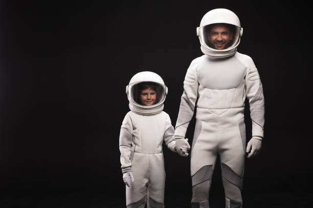 istock Trained spacemen are smiling together 895816310