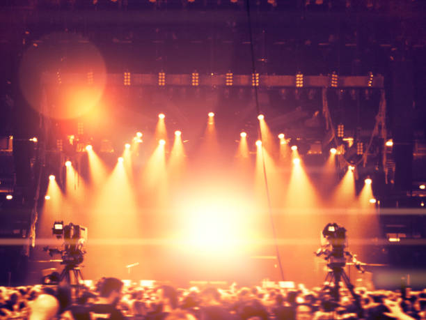 istock Concert stage attended by a large crowd 895816330