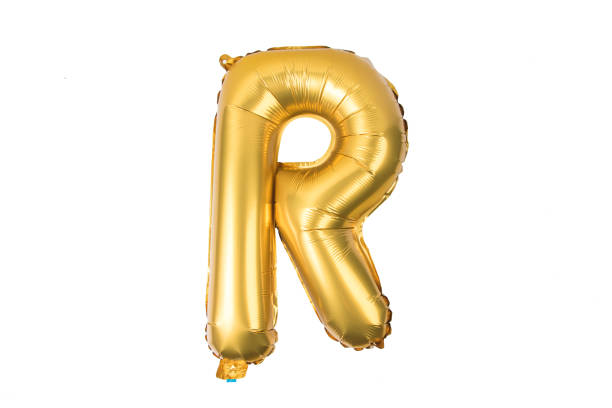 istock English alphabet   from yellow (Golden) balloons on a white background . 895834448