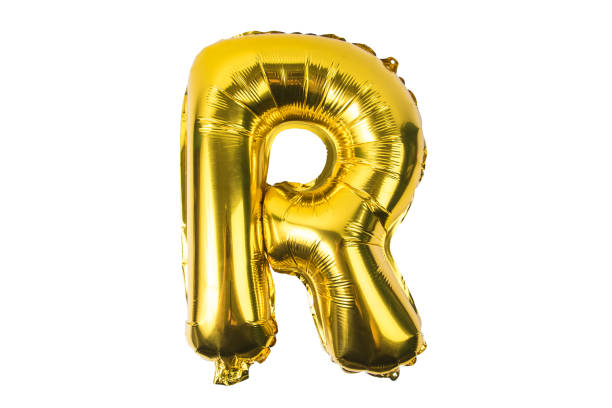 istock English alphabet   from yellow (Golden) balloons on a white background . 895853526