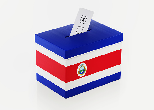 Ballot box textured with Costa Rican flag. Isolated on white background. A vote envelope is entering into the ballot box. Horizontal composition with copy space. Great use for referendum and presidential elections related concepts. Clipping path is included.