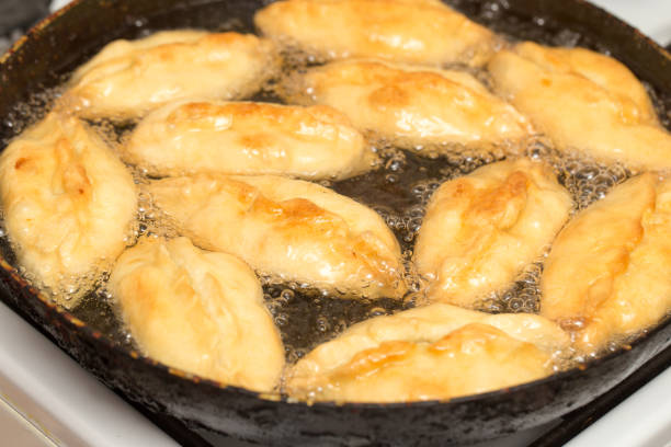 istock patties are fried in a pan 895895354