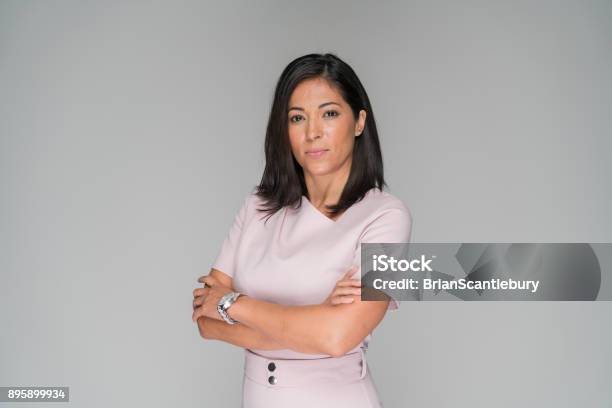 Professionally Dressed Wonam In Pink Stock Photo - Download Image Now - Women, One Woman Only, Businesswoman