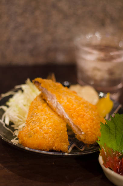 Deep fried horse mackerel and shochu are one of the most popular combinations when drunk in Japan. Shochu is Japanese original wine and it is distilled liquor.