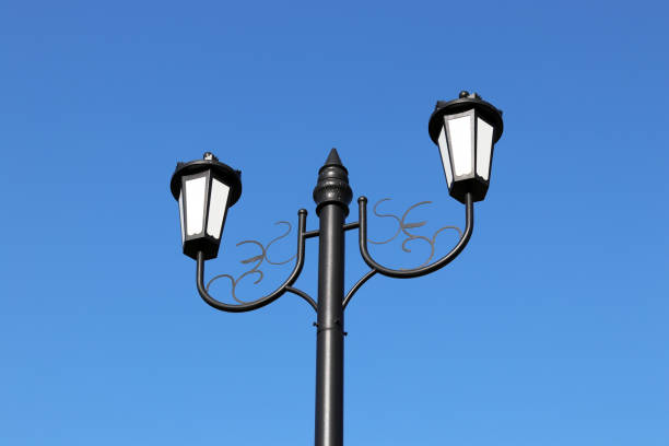 istock A two-backed lamp against the blue sky 895905644