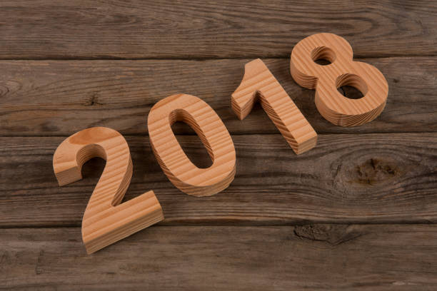 istock New Year 2018 with Wooden Numbers 895918482