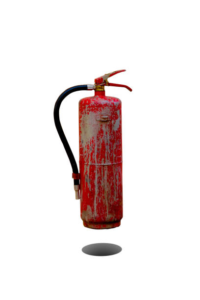 The old used fire extinguisher isolated on white background. stock photo