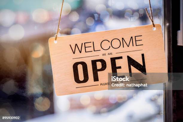 Wooden Sign Board Hanging On Door Of Cafe Stock Photo - Download Image Now - Small Business, Open, Sign