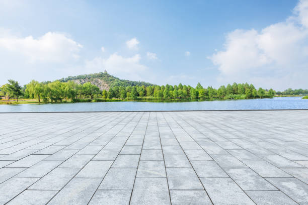 istock empty square and green mountain nature landscape in city park 895957356